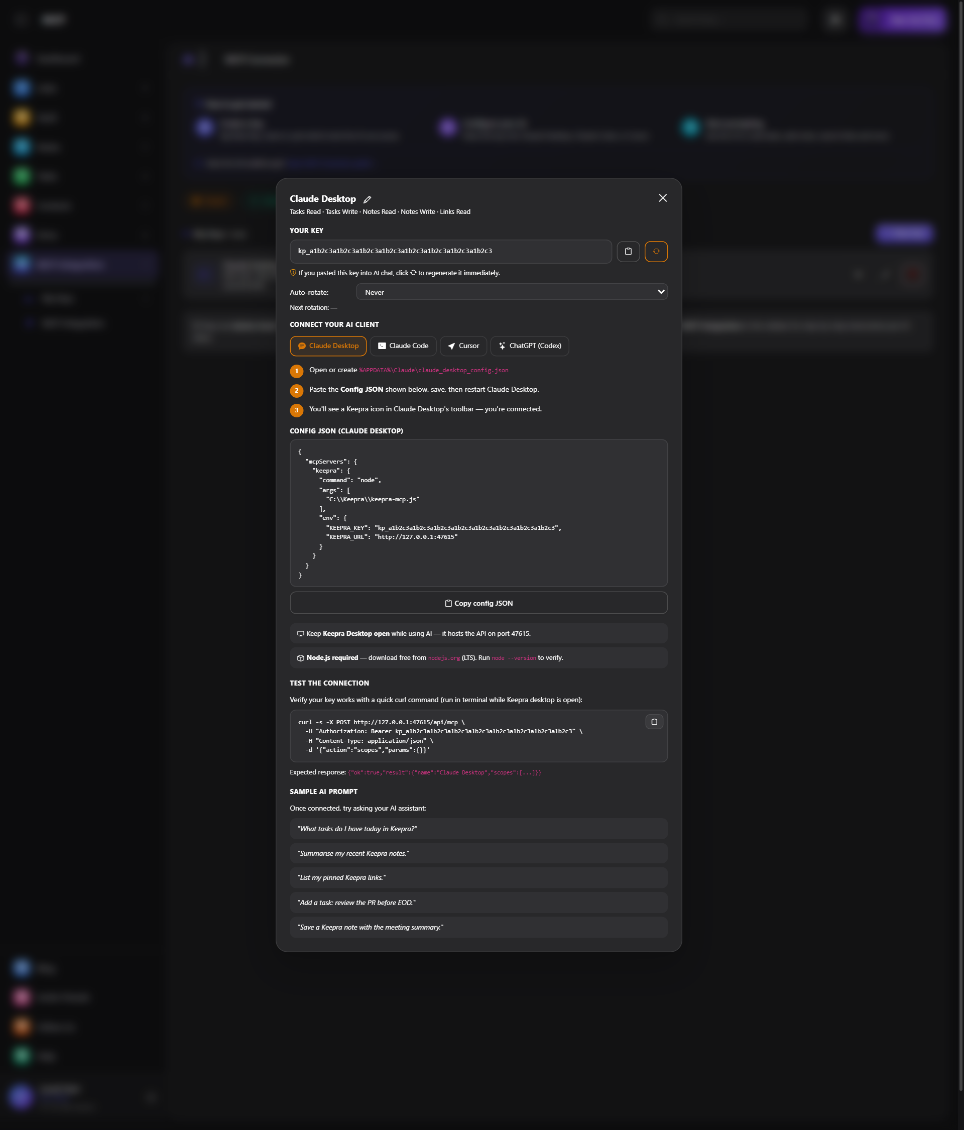 The reveal-key panel open over the Keepra app showing the kp_ key value with copy and regenerate buttons, client tabs, the ready-to-paste Config JSON for Claude Desktop, a test-the-connection command and sample AI prompts